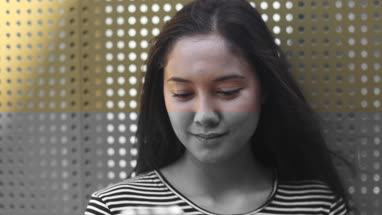 Young female taking selfie