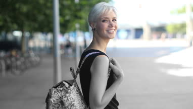 Young female walking down street