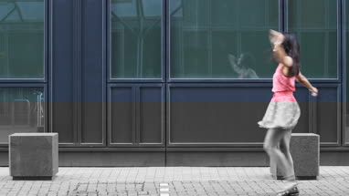 Young afro american woman dancing in street