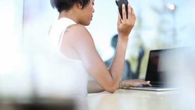 Afro-american business woman in cafe