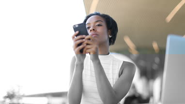 Afro-american business woman in cafe