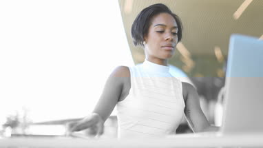 Afro-american business woman in cafe