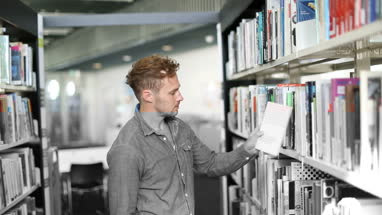 Adult student in library