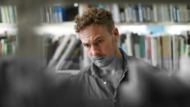 Adult student in library