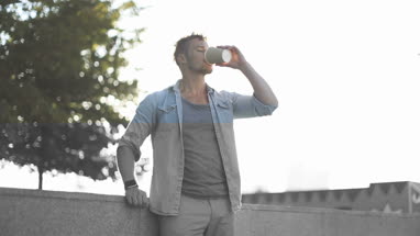 Trendy male using smartwatch