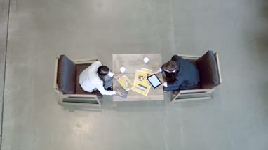 High angle view on business meeting in office lobby