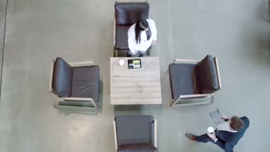 High angle view on business meeting in office lobby