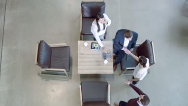 High angle view on business meeting in office lobby