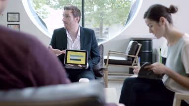 Business meeting in office lobby