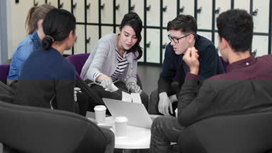 Students working on a project together