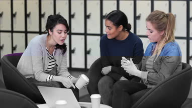 Female students working on a project together