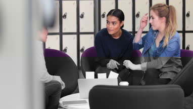 Female students working on a project together