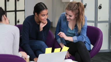 Female students working on a project together