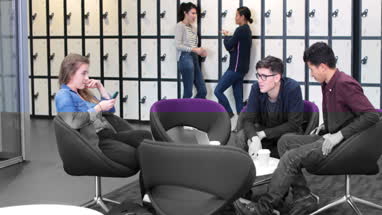 Classmates working on a project together