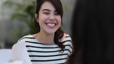 Female student celebrating exam result