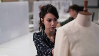 Fashion student designing a garment