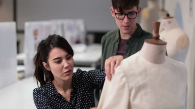 Fashion students working on a design