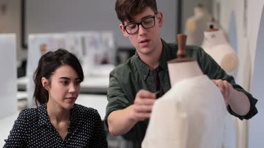 Fashion students working on a design