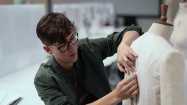 Fashion student designing a garment