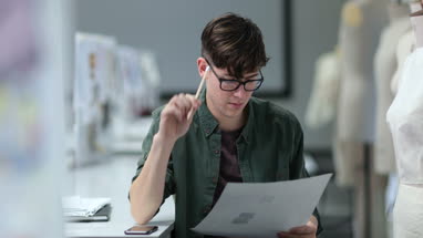 Fashion student designing a garment