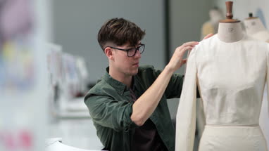 Fashion student designing a garment