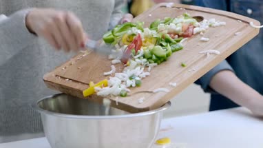Mom and daughter preparing a meal together