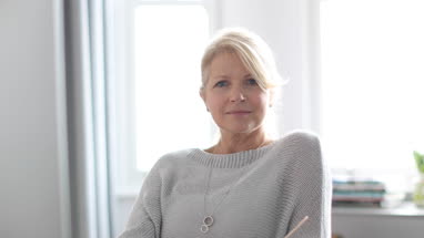 Portrait of mature business woman in office