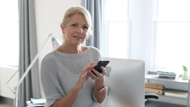 Portrait of mature business woman in office