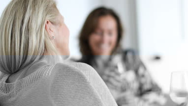 Mature female friends having a conversation