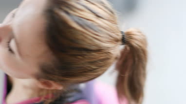 Young adult female doing yoga at home