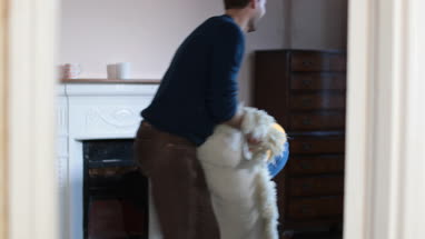 Couple having fun unpacking
