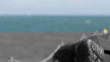 Couple having fun by coastline