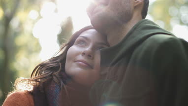 Couple in forest in Fall