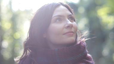 Woman in forest in Fall