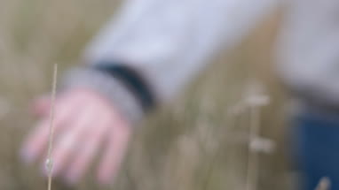 Woman in cornfield in fall