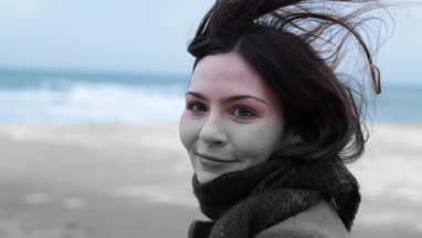 Point of view shot on beach in winter with girlfriend