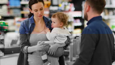 Mother with daughter at pharmacy