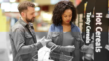 Couple doing weekly grocery shop together