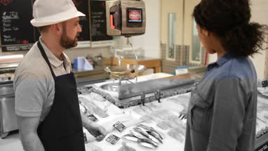 Customer asking fishmonger for advice