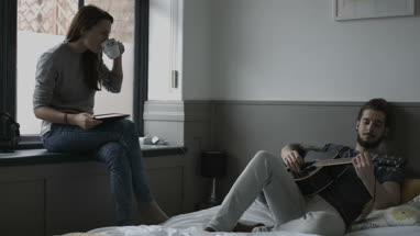 Young couple relaxing at home