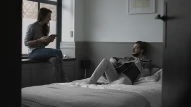 Young couple relaxing at home
