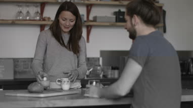 Young couple enjoying breakfast together
