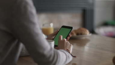 POV young adult female using smartphone