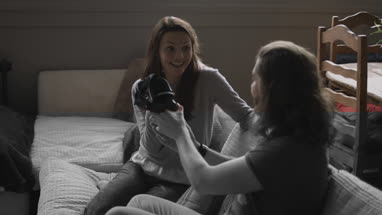 Young adult female using VR headset for the first time