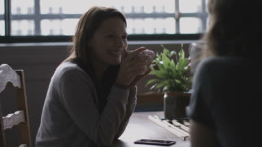 Young adult couple in a caf� together