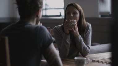Young adult couple in a caf� together