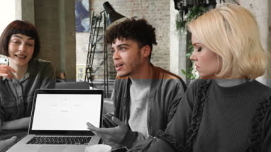 Group of young entrepreneurs working on an idea