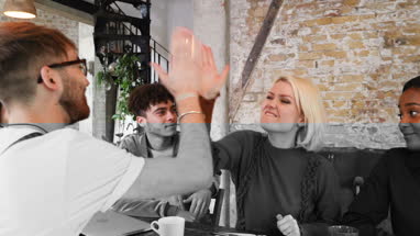 Group of young entrepreneurs brainstorming an idea