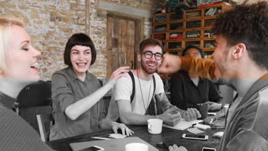 Group of young entrepreneurs celebrating success