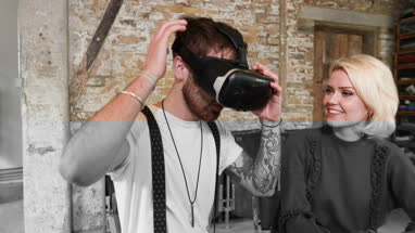 Young entrepreneurs in a meeting with VR headset